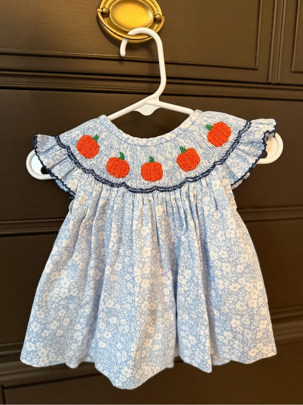 Smocked Blue Floral Baby Dress with Orange Pumpkin Motif
